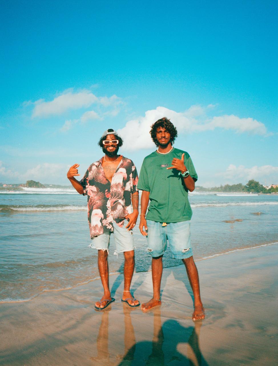 Beach boys with peace signs